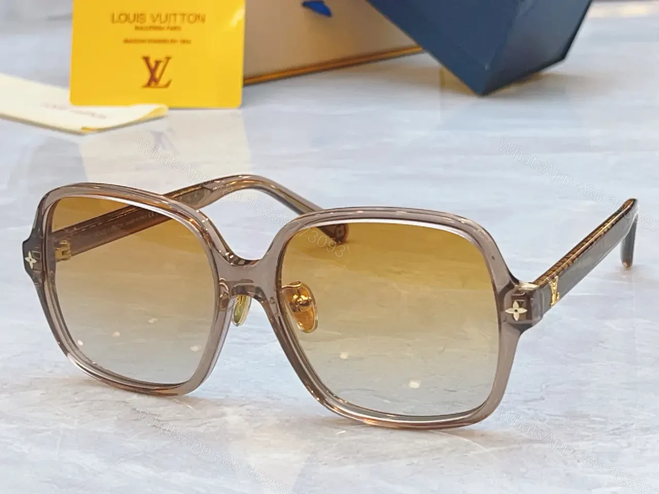 View 10 of Gray Glossy Square Sunglasses Gradient Lenses, Metal Accents, Luxury Style, Louis Vuitton Temples (No Brand Details)