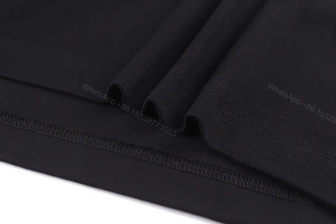 View 3 of Minimalist Black Tee, Premium Cotton, Modern Fit, Logo Detail, T-Shirt