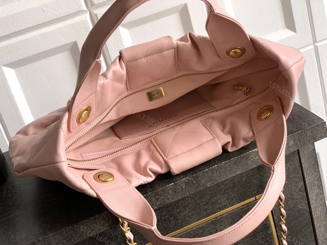View 6 of Soft Pink Quilted Handbag with Gold Accents, Compact Luxury Tote