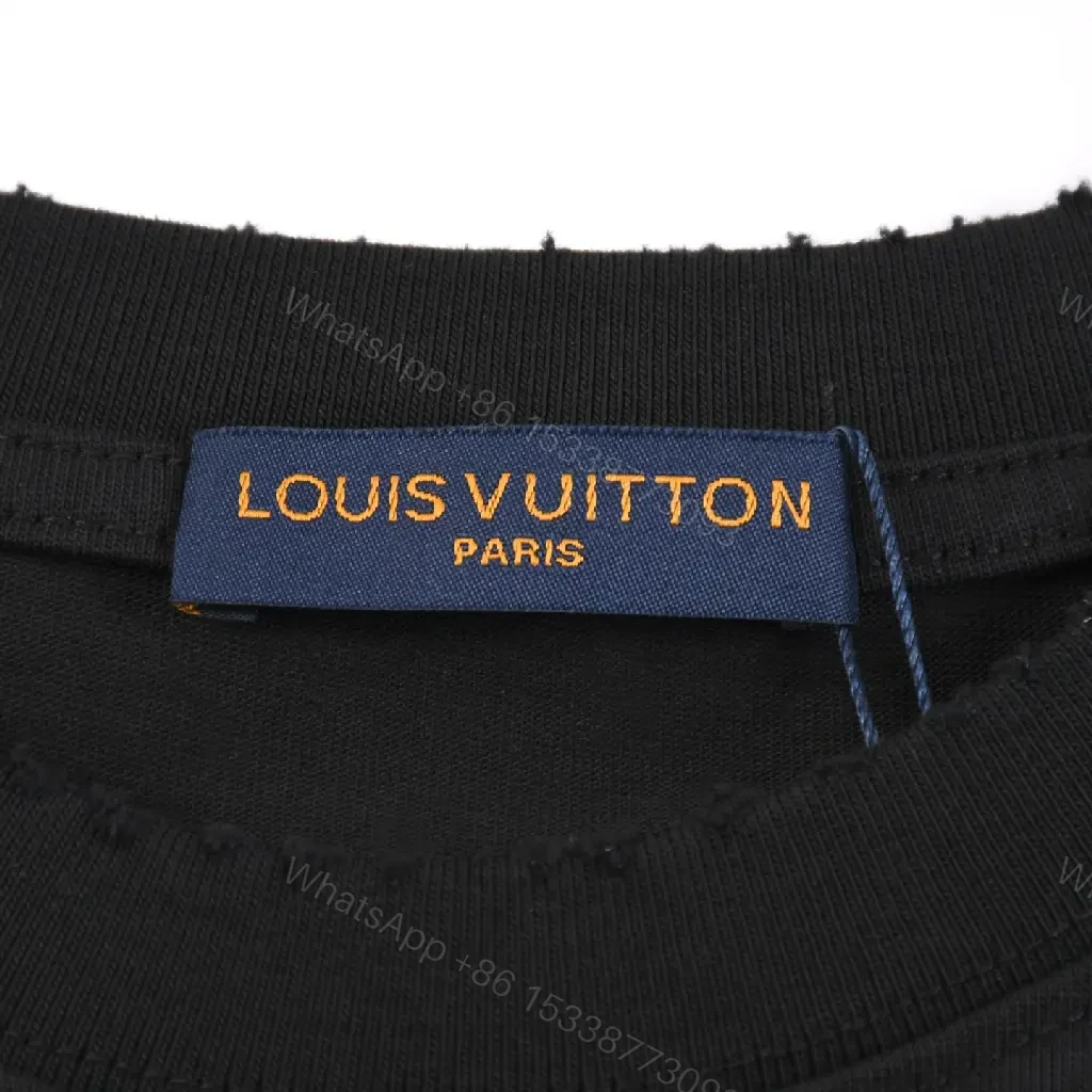 View 5 of Black Cotton-Blend Crewneck Tee: Subtle LV Embroidery, Luxury Comfort
