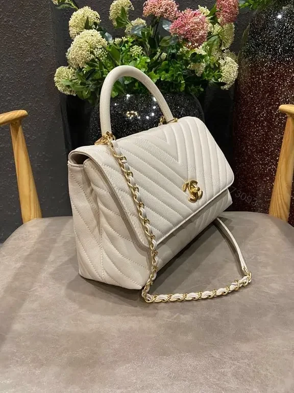 View 2 of White Quilted Luxury Bag with Gold Logo â€“ Chic Everyday Elegance
