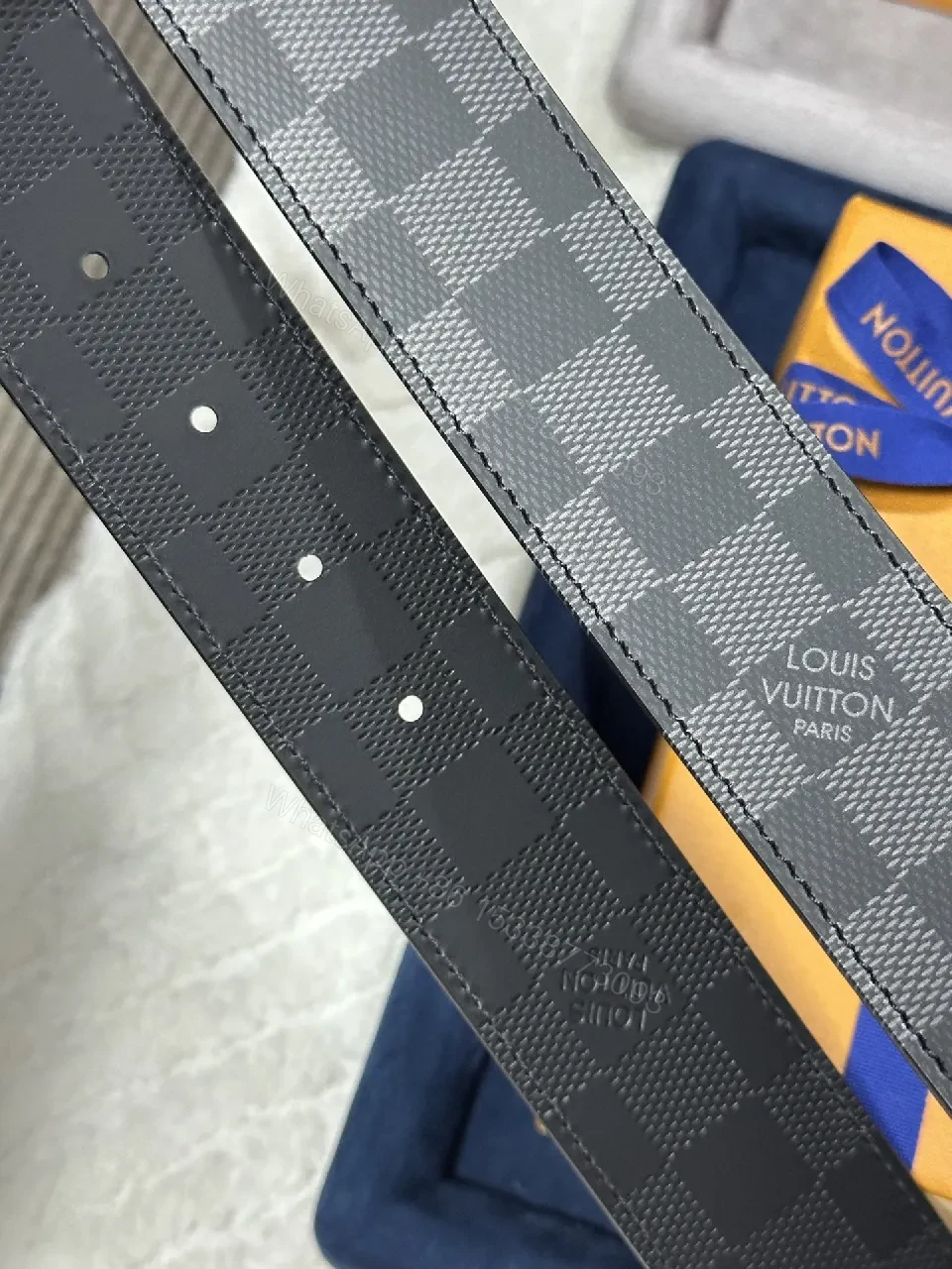 View 2 of Checkerboard Leather Belt with Signature Buckle — Modern Luxury Belt