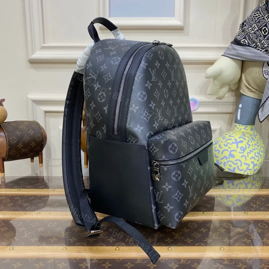 View 6 of Louis Vuitton Discovery Backpack in Monogram Eclipse canvas