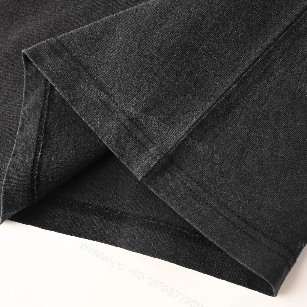 View 8 of Minimalist Black Cotton Tee with Subtle Red Embroidery