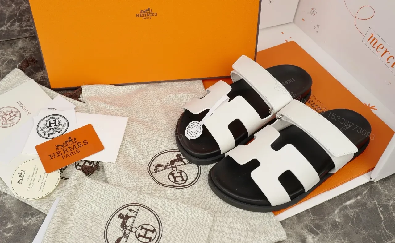 Minimalist White Leather Sandals with Black Footbed and Hermes-Inspired Hardware — view 1