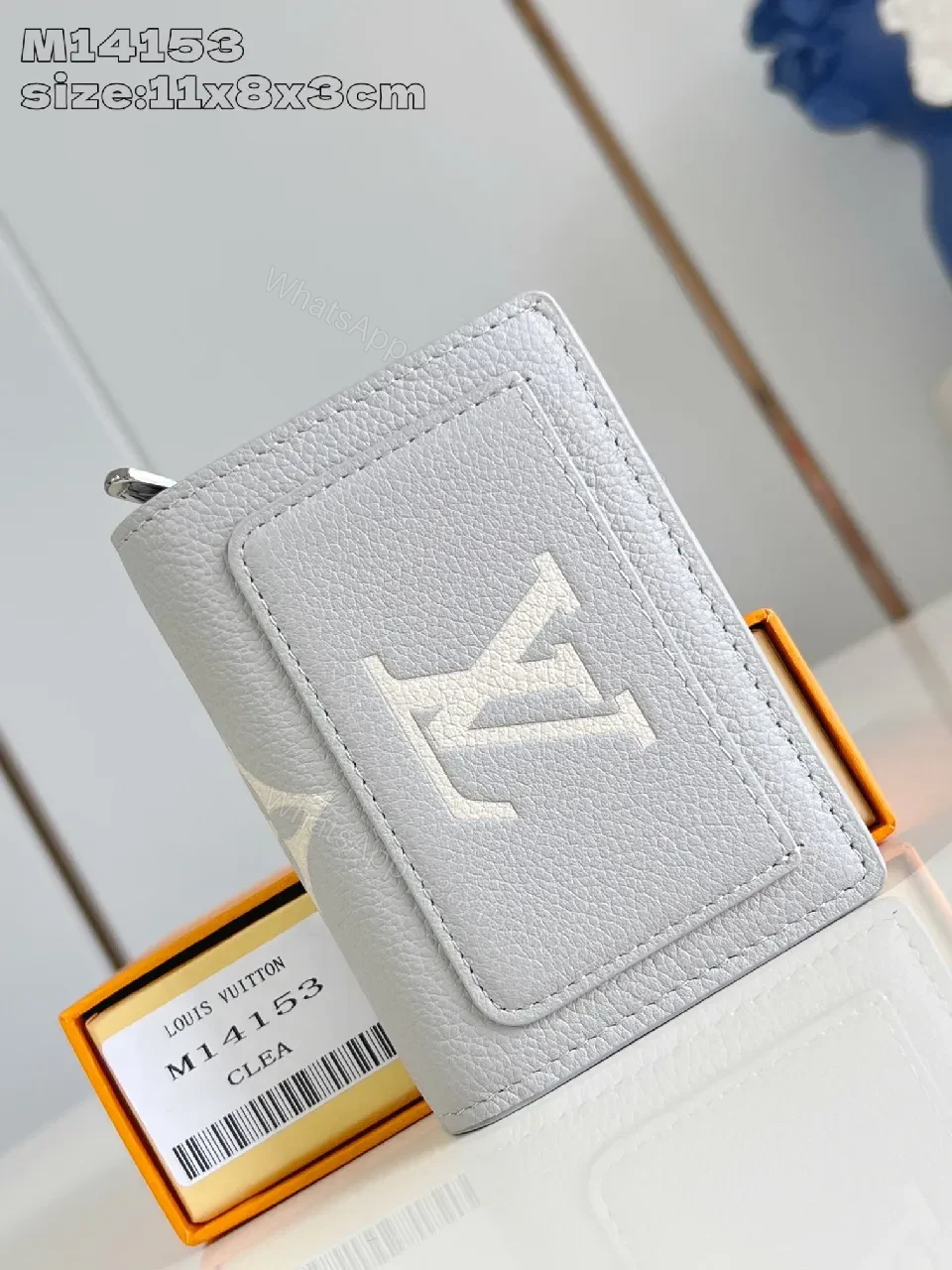 View 2 of Textured Leather Compact Wallet: Monogram Accent, Secure Zip, Minimal Luxury