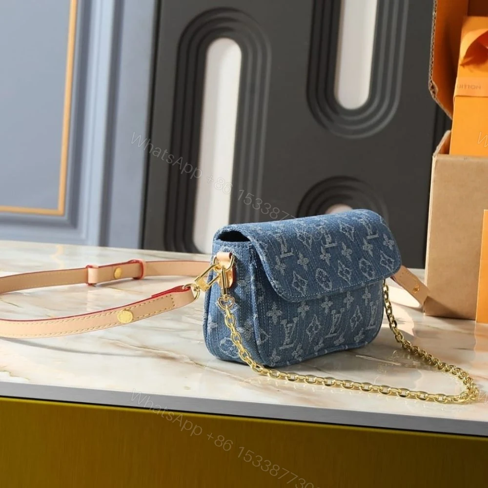 View 3 of Louis Vuitton Wallet On Chain Ivy Monogram Denim Blue 23Cm