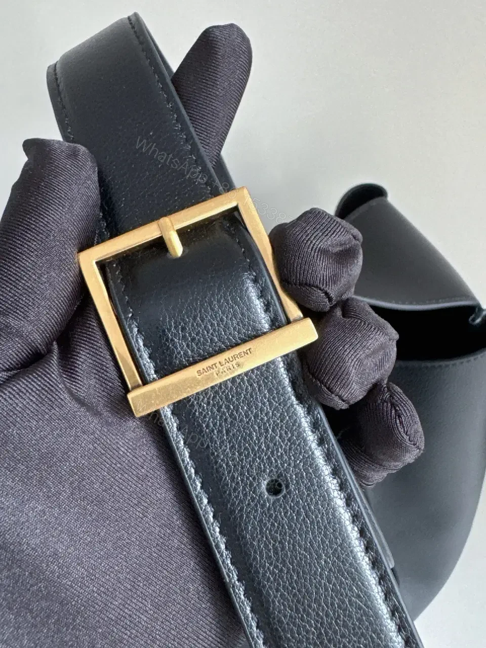 View 7 of Navy Leather Bucket Bag with Gold YSL Charm and Zippered Pocket