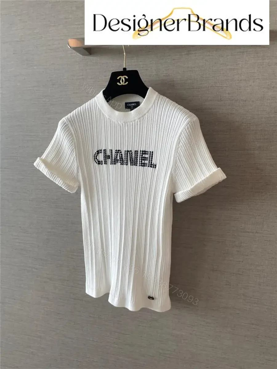 View 4 of White Knit Tee with Logo Embellishment – Elevated Texture, Modern Luxury