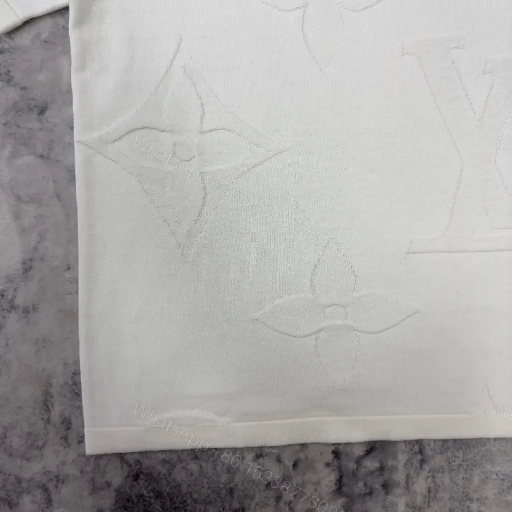 View 9 of Textured White Tee with Embossed Luxury Pattern - Minimalist Style Shirt