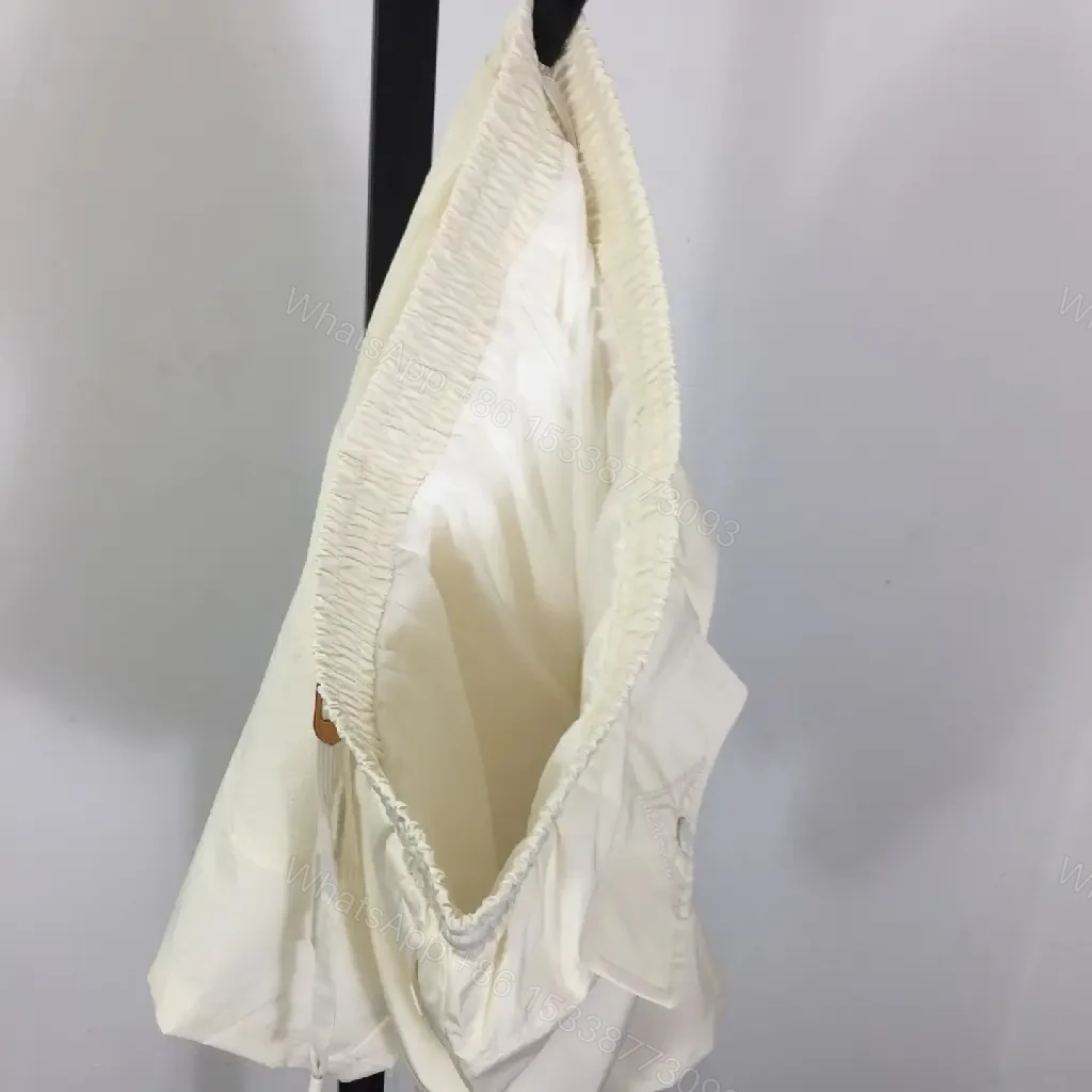 View 8 of Cream Canvas Shorts - Relaxed Style, Drawstring Waist, LV Logo