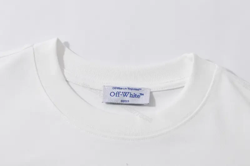 View 6 of Minimalist White Tee: Premium Cotton, Subtle Logo, Everyday Luxury