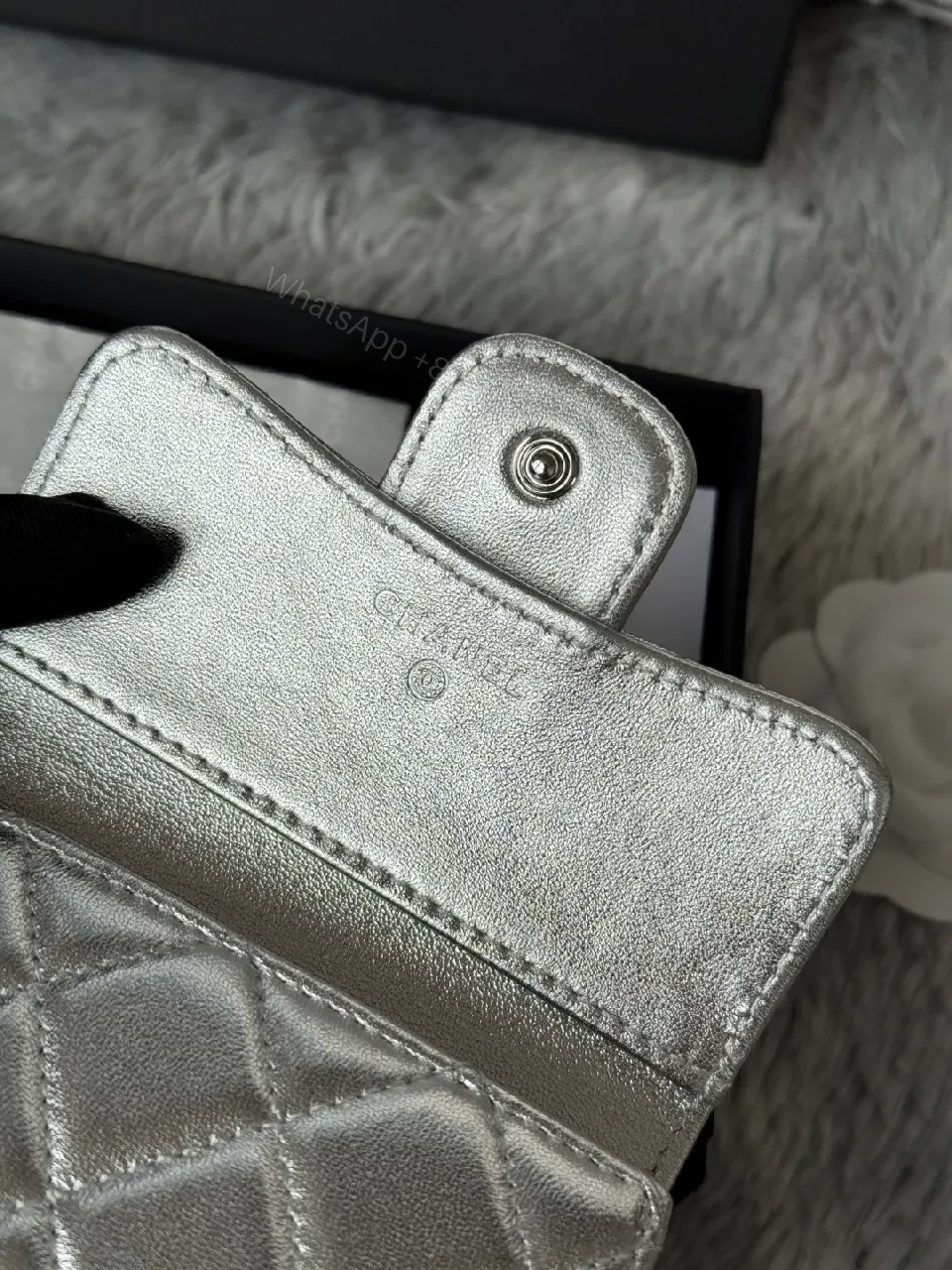 View 4 of Compact Silver Quilted Wallet with Signature Hardware