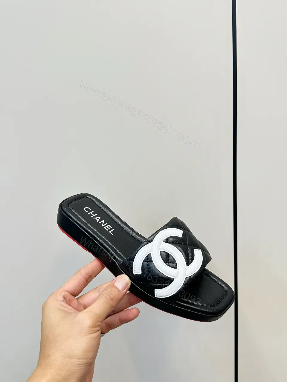 View 7 of Black Quilted Chanel Sliders with White Logo, Slide Sandals