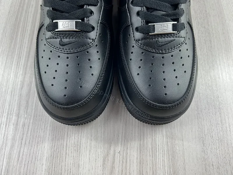 View 5 of Covert Black Leather Nike X Supreme Luxe Sneaker