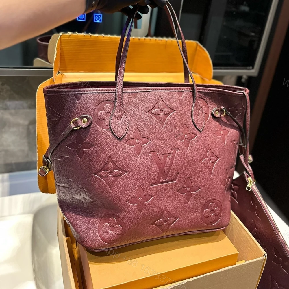 View 2 of Louis Vuitton Neverfull MM Monogram Empreinte Bag Wine Red 32Cm