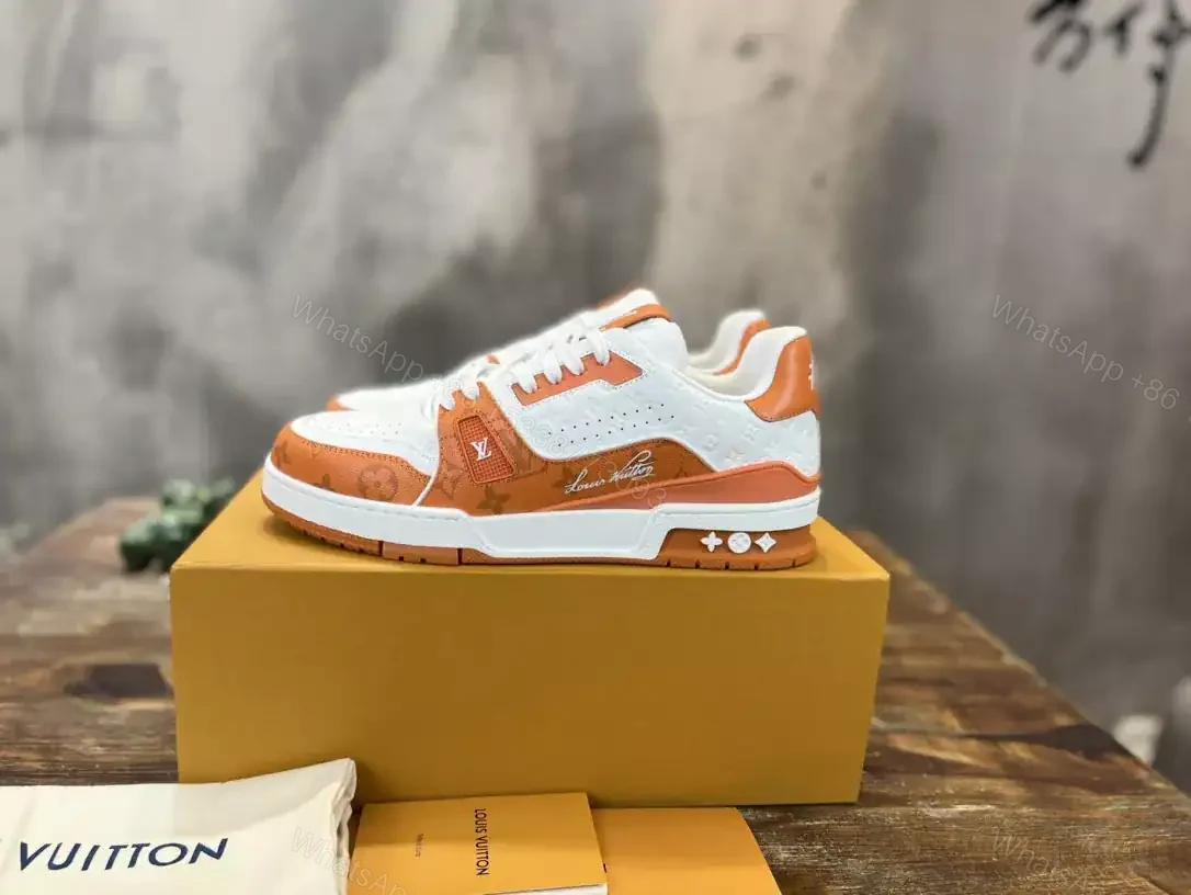 View 2 of LOUIS VUITTON TRAINE SNEAKERS IN WHITE AND ORANGE – LSVT386