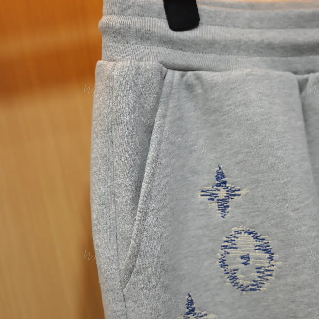 View 3 of Grey Cotton Shorts Louis Vuitton Motifs Casual Embroidered Logo Sweatshorts