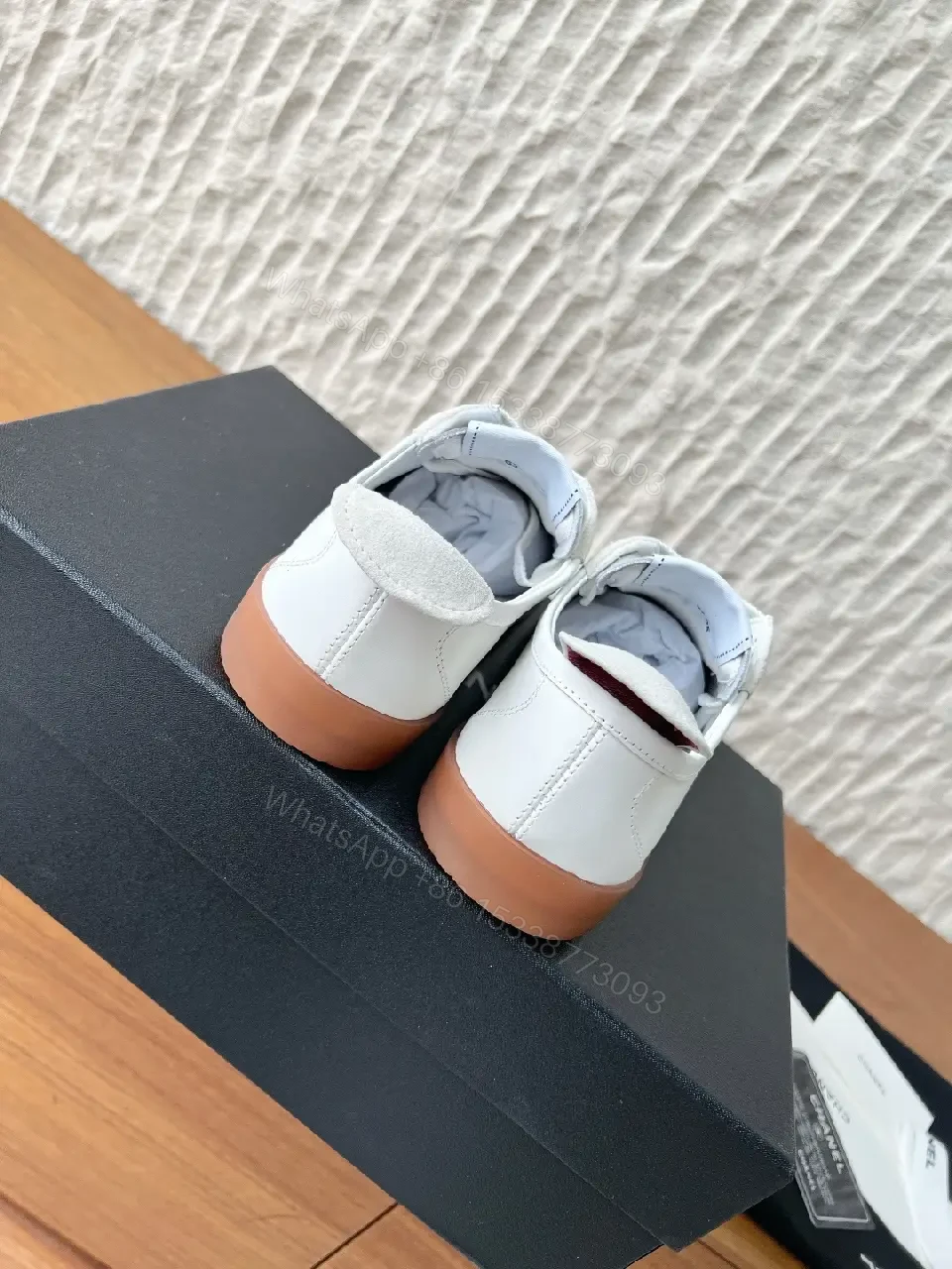 View 2 of Chic Monochrome Leather-Accent Luxury Sneaker, Low-Top