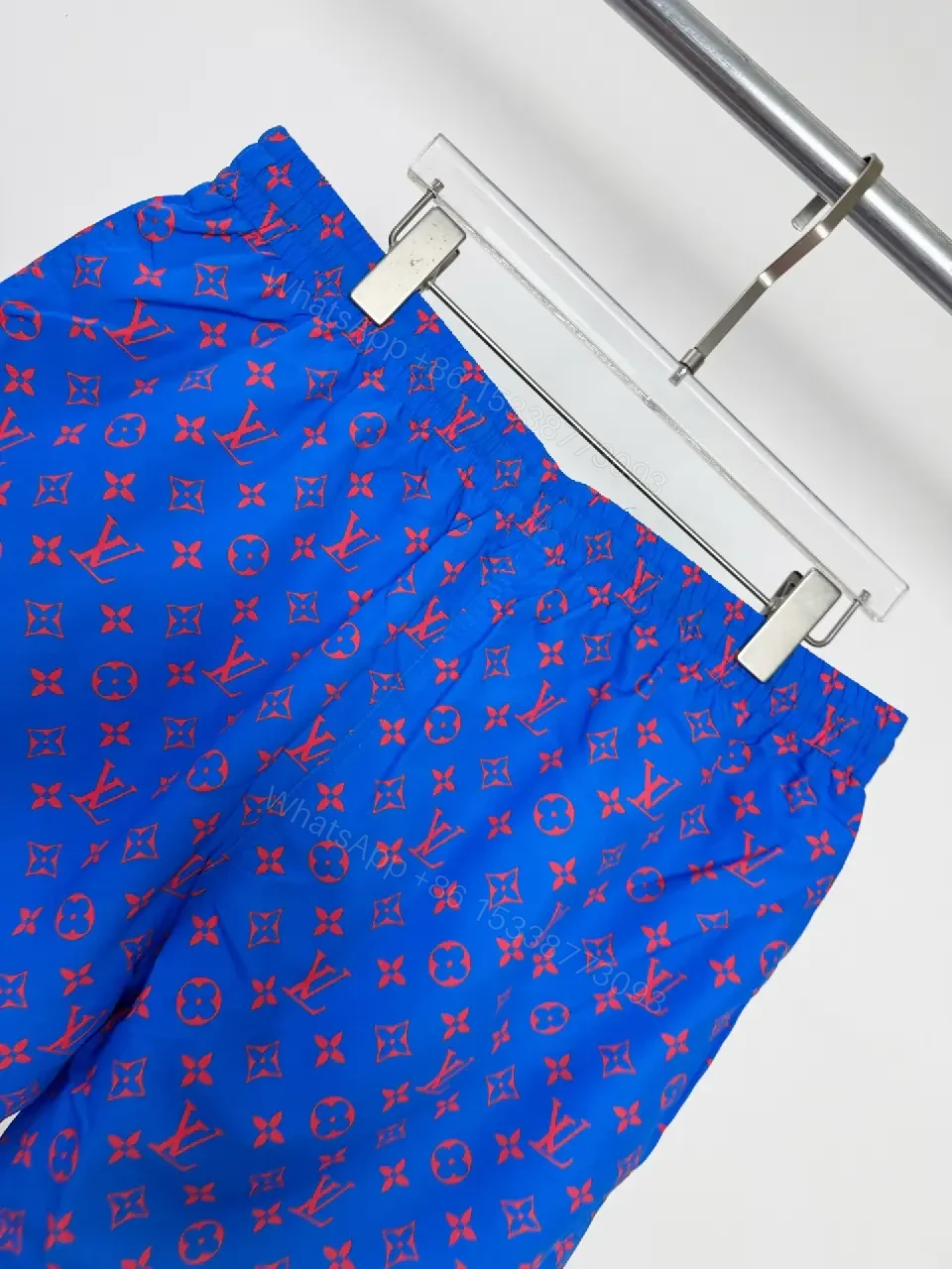 View 5 of Blue Louis Vuitton Monogram Swim Shorts with Red Drawstring