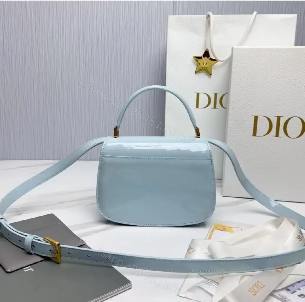 View 3 of Soft Sky Blue Mini Bag with Gold Hardware Logo Accent Bag