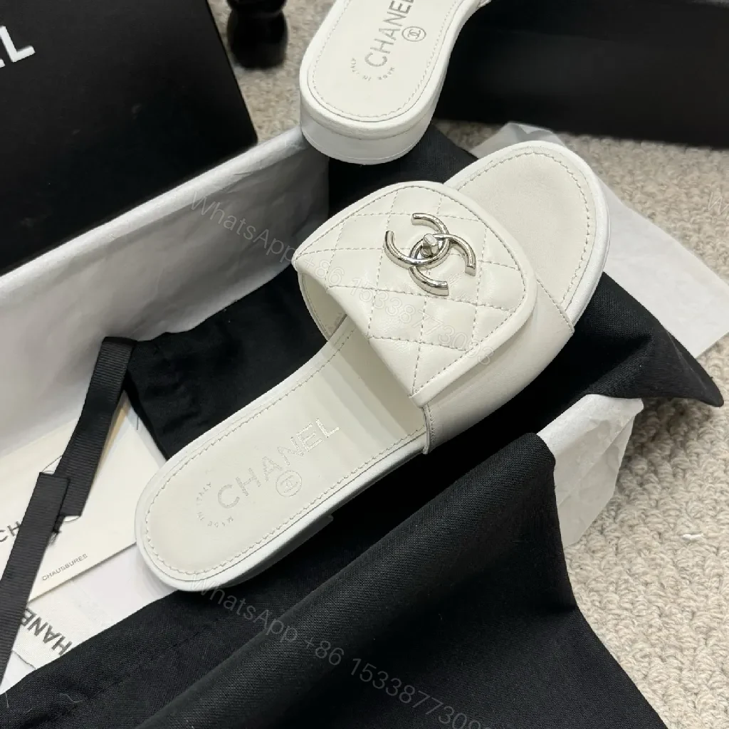 View 3 of Quilted White Leather Slides with Logo Detail, Open-Toe Slide, Luxury Comfort