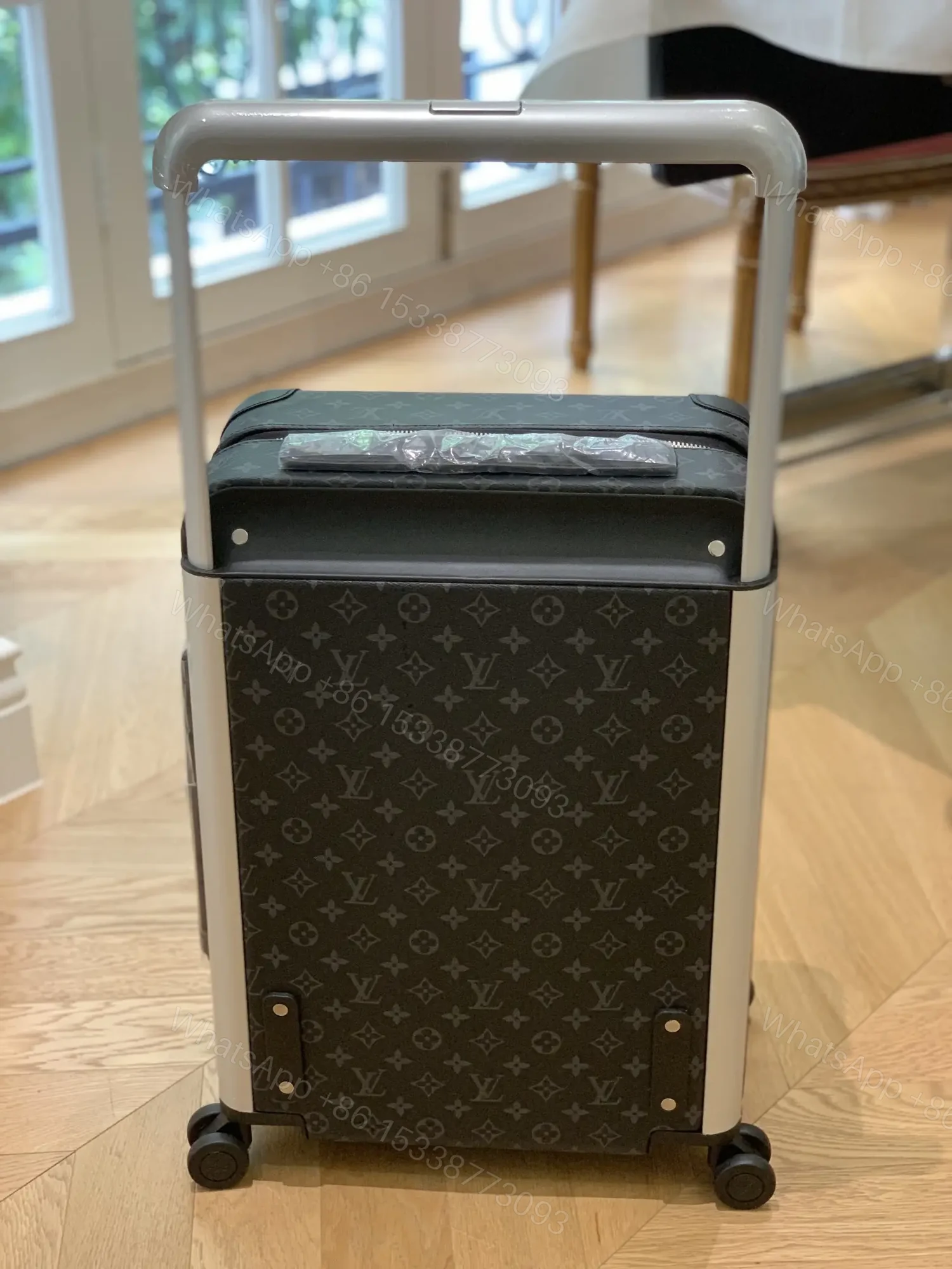 View 4 of Louis Vuitton Horizon 55 Monogram Eclipse canvas