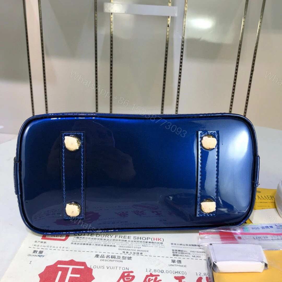 View 17 of Louis Vuitton Alma
