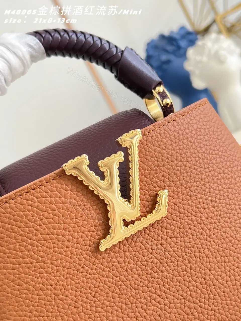 View 3 of Caramel Leather Mini Bag: Structured, Gold Emblem, Compact Luxury