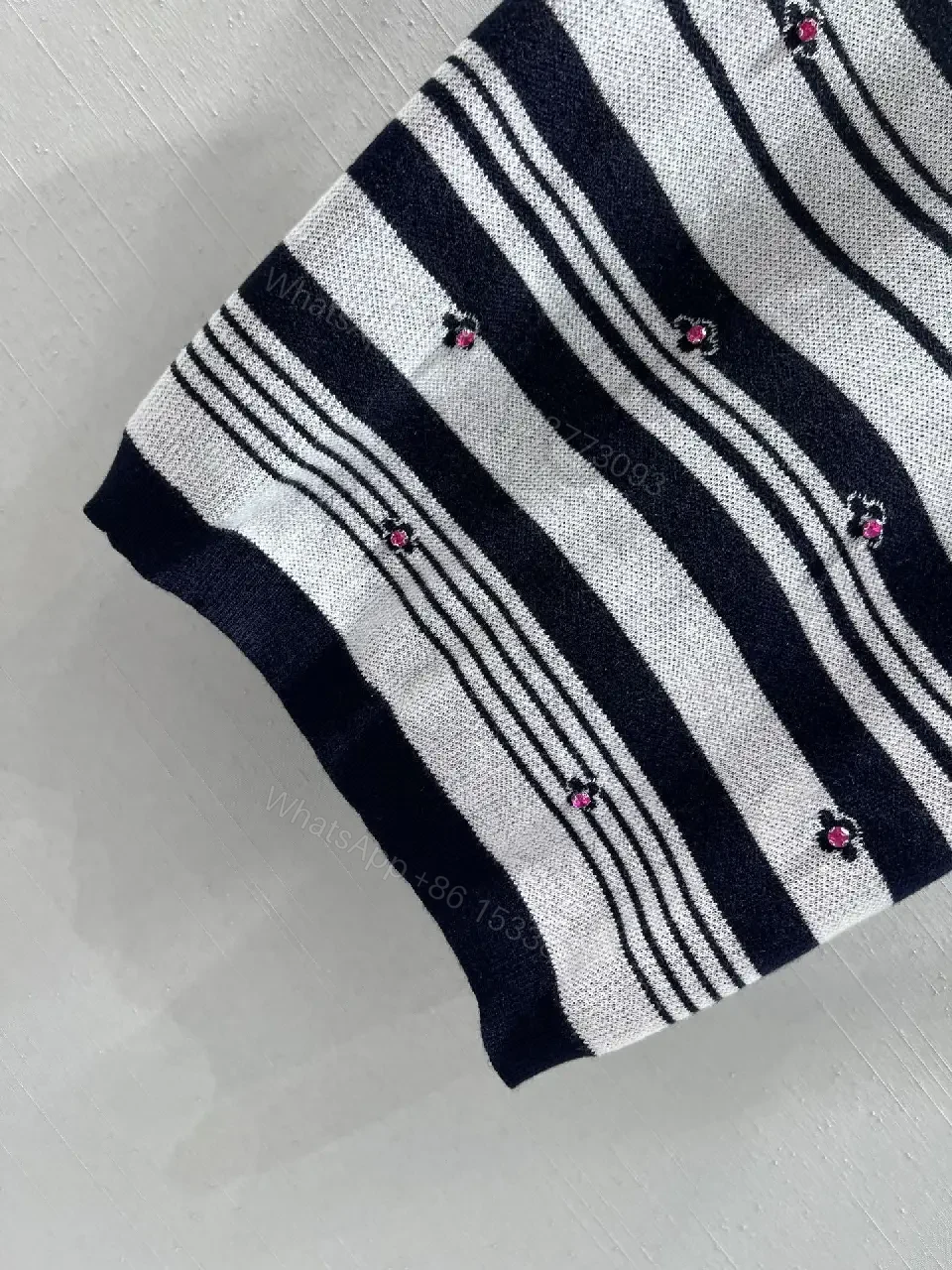 View 8 of Chanel-Influenced Striped Knit Top with Subtle Embellishments