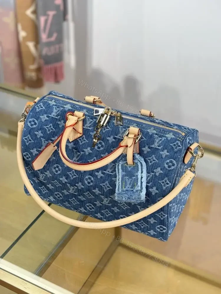 View 2 of Louis Vuitton Monogram Denim Speedy Soft 30 bag