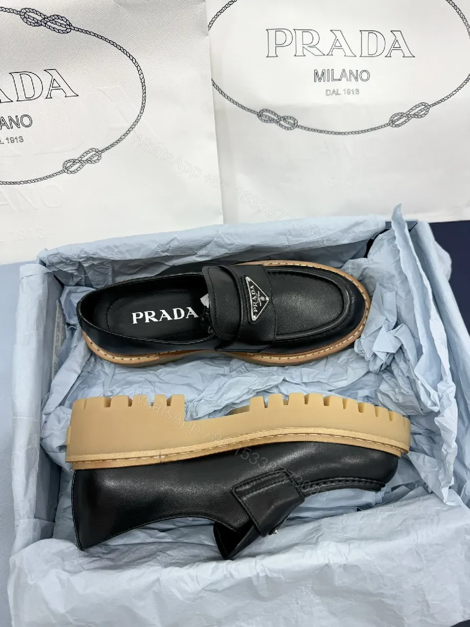 View 2 of Black Leather Loafers: Luxe Signature Crest, Rugged Comfort