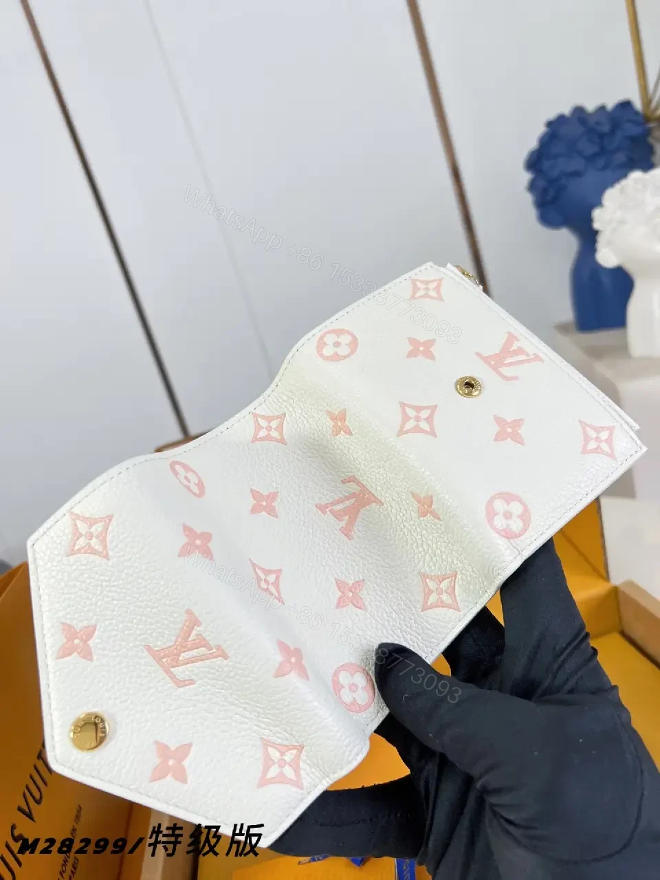 View 4 of Chic White Pebble Leather Wallet: Pink LV Accents, Compact Luxury
