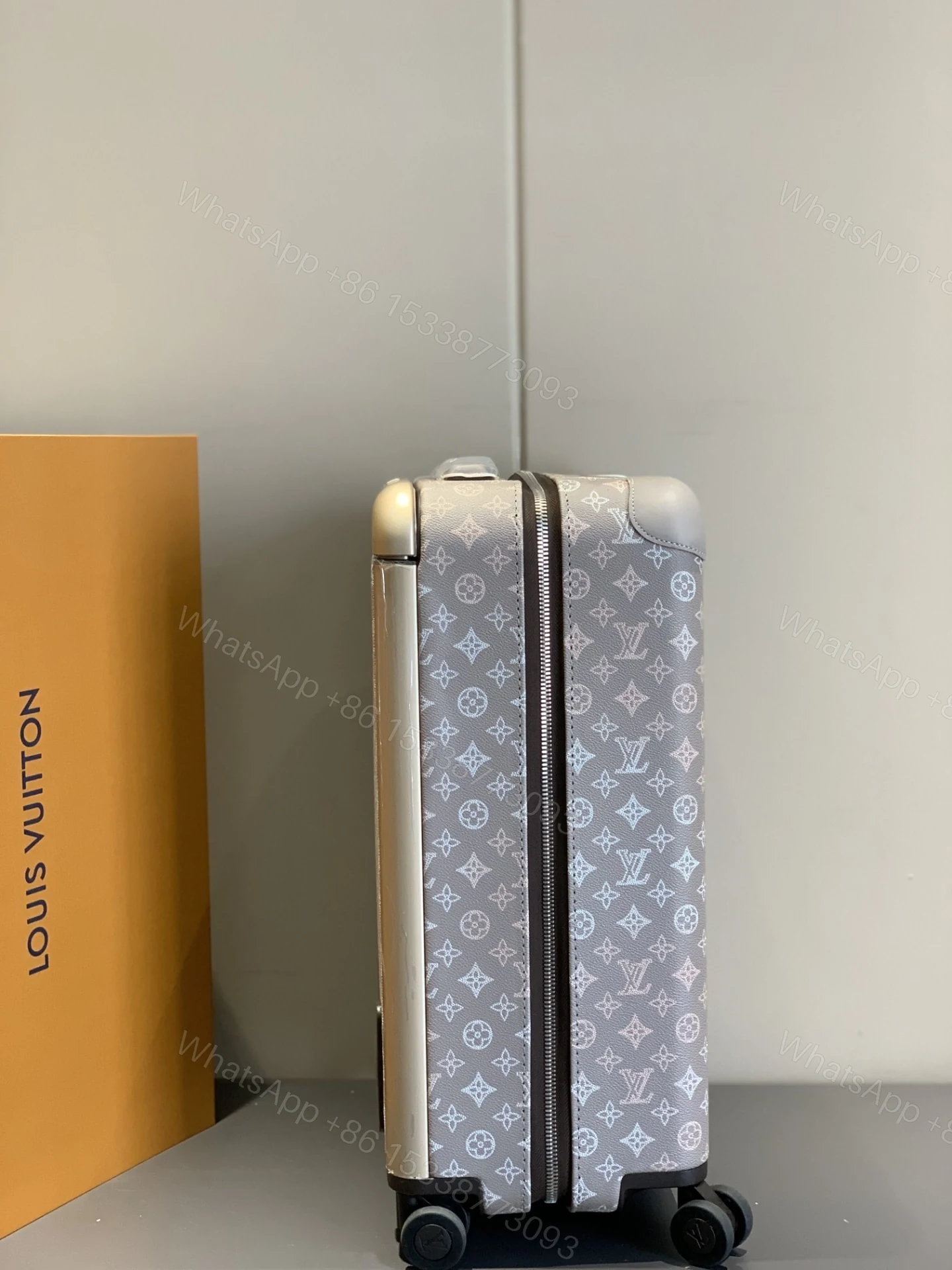 View 4 of Louis Vuitton Horizon 55 Suitcase Mahina Perforated Calfskin Leather Gray 55Cm M10282