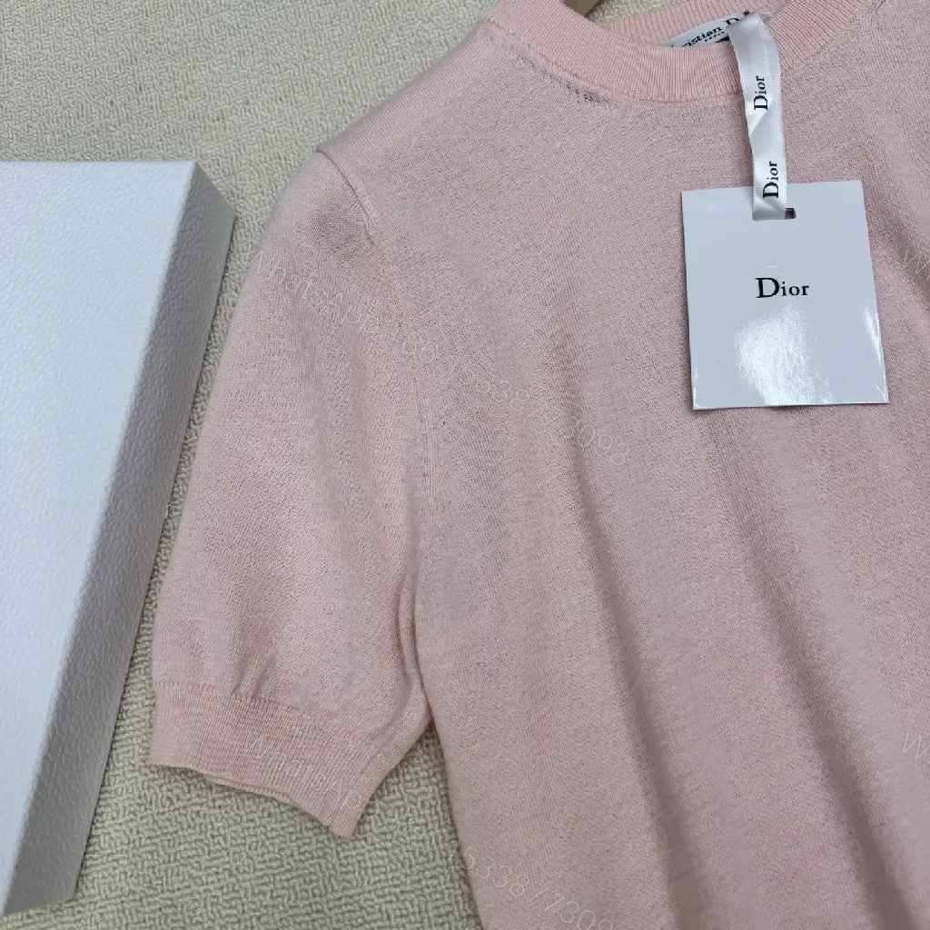 View 4 of Soft Pink Knit Top with Crest – Elegant Everyday Essential