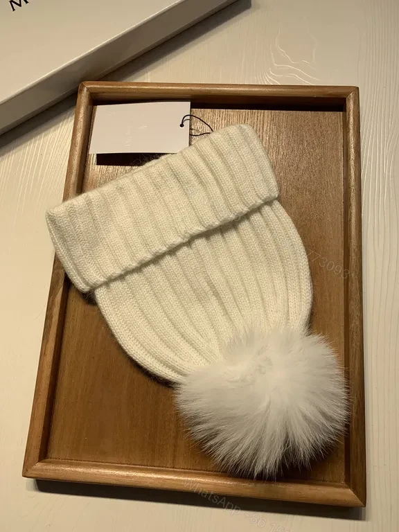 View 9 of Cream Beanie: Wool-Blend Knit with Pom-Pom â€“ Moncler Style