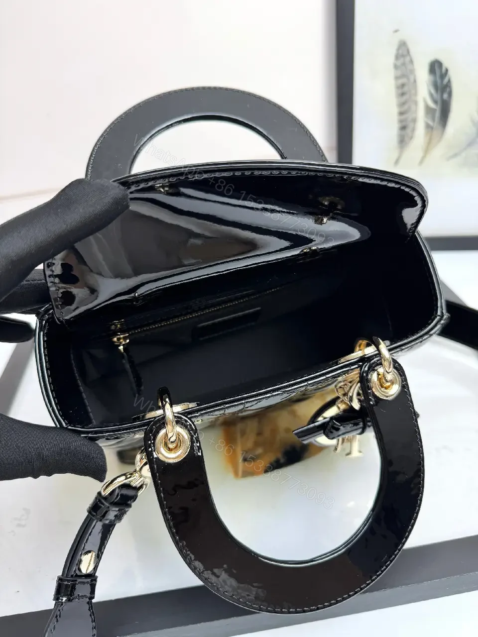 View 3 of Quilted Patent Mini Bag with Gold-Tone Charms, Black