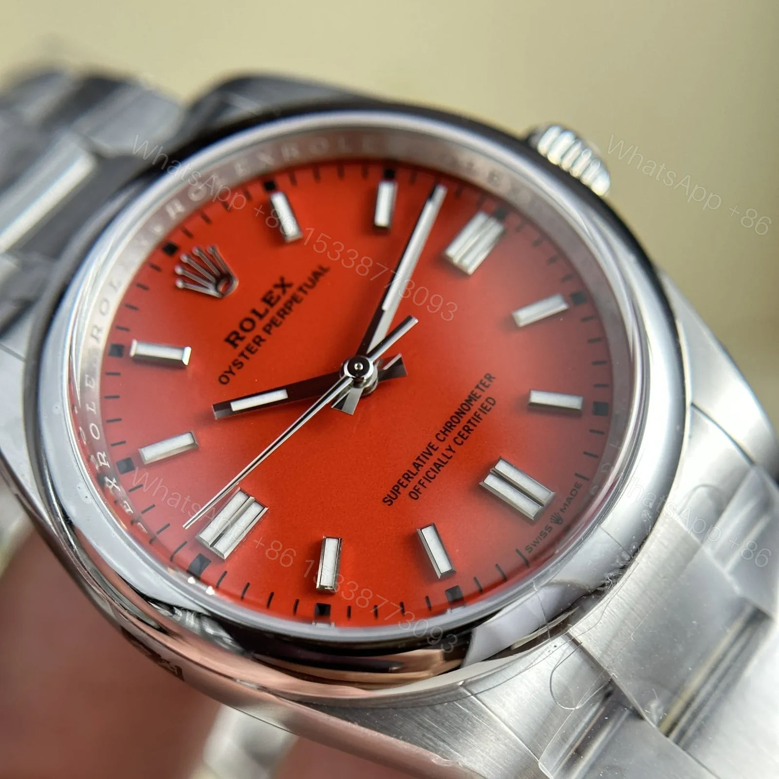View 3 of Replica Rolex Oyster Perpetual Coral Red Dial 124300 41 mm