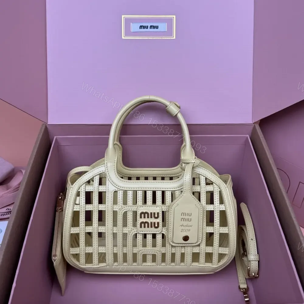 高仿miumiu*5BA294小牛皮鏤空手提包黃色免檢版 — view 1