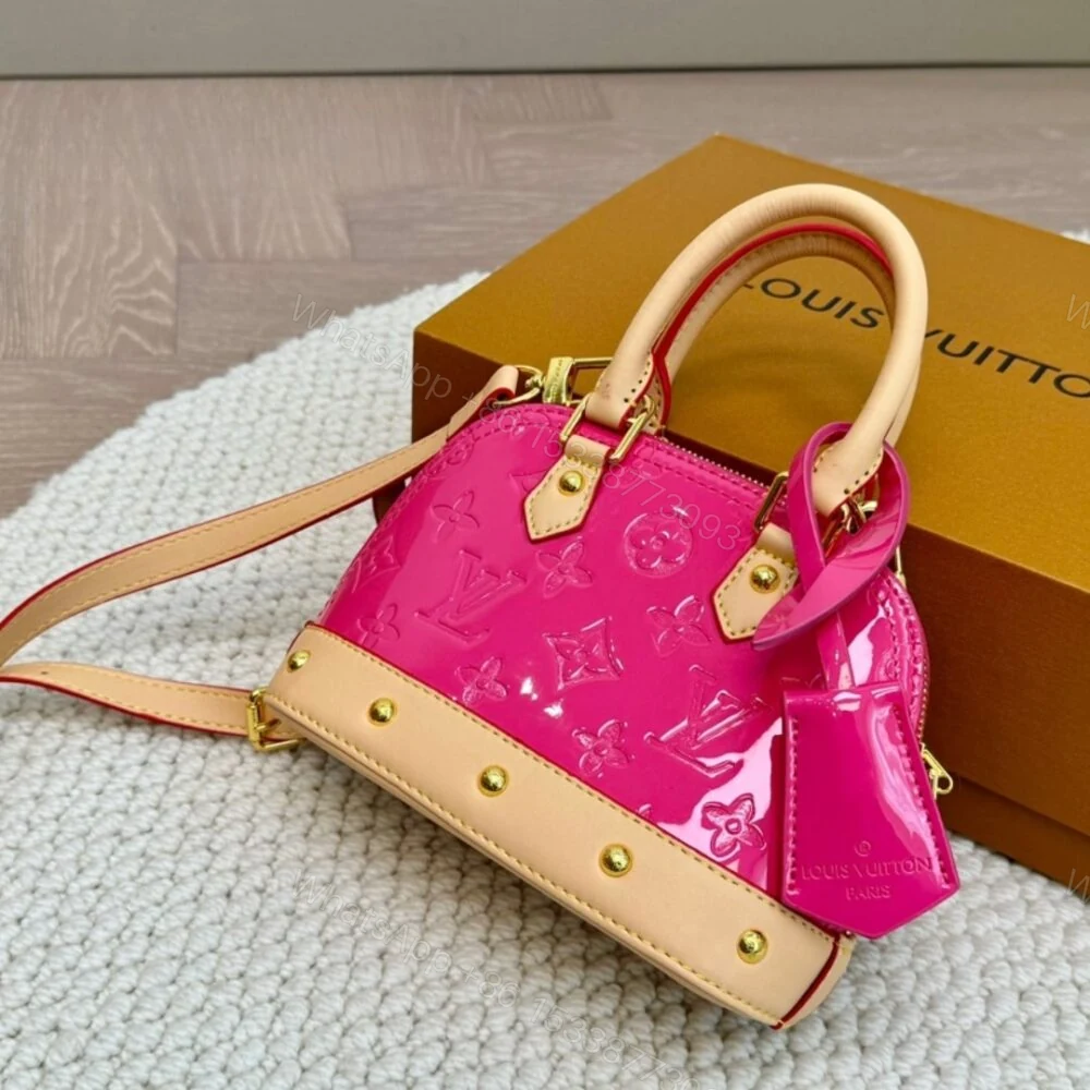 View 2 of Louis Vuitton Alma Nano Monogram Vernis Embossed Neon Pink 18Cm M90611
