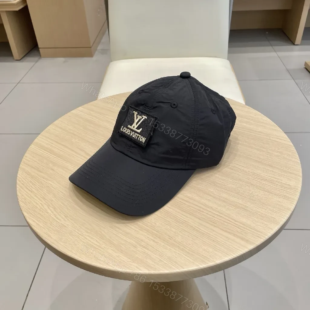 View 8 of Compact Black Cap with Subtle LV Patch, Six-Panel, Adjustable Strap
