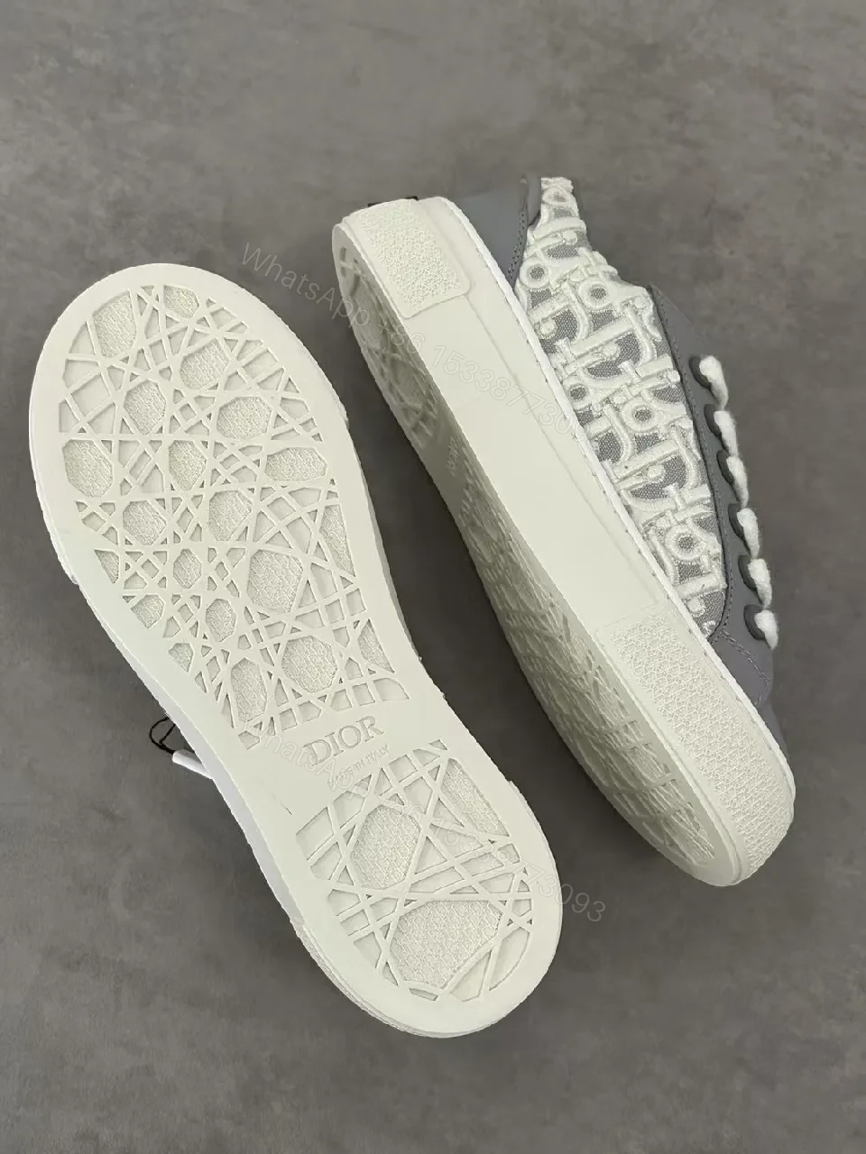 View 3 of Gray Leather Sneaker with Monogram Pattern, Luxurious Texture, Casual High-Tops