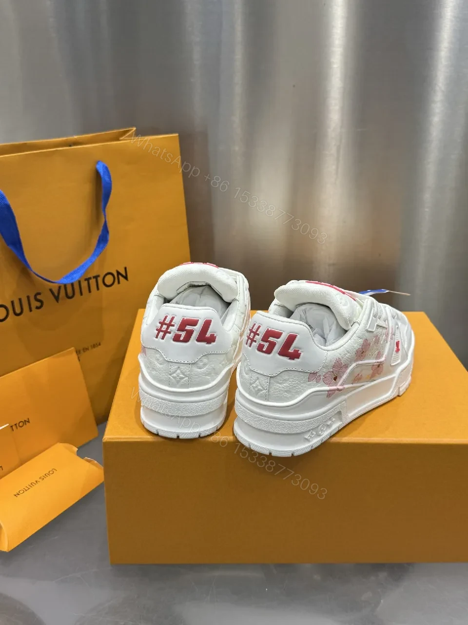 View 9 of White Leather Low-Top Trainer with Pink Embroidery Detail