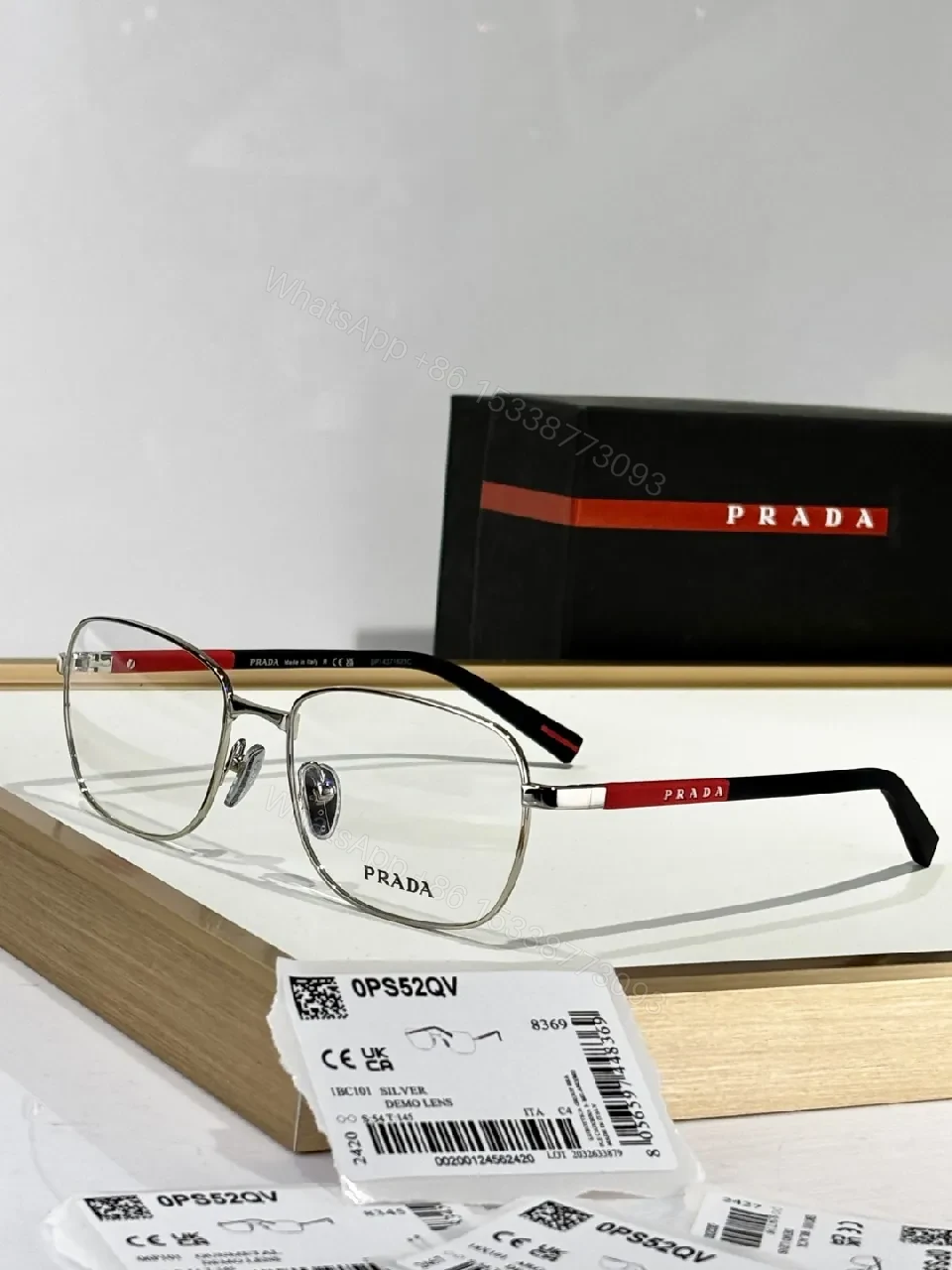 View 6 of Silver Metal Minimalist Precision Eyewear with Red Accents, Luxury Glasses