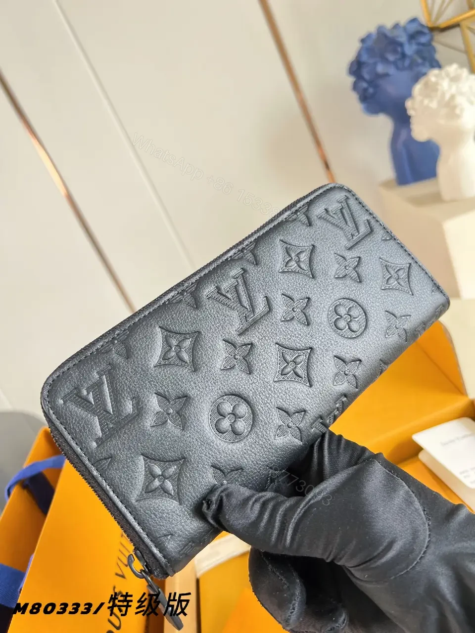 View 3 of Navy Leather Zip Continental Wallet with LV Embossed Monogram