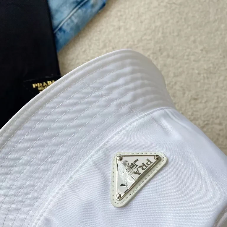View 4 of Prada White Nylon Bucket Hat â€“ Luxe Minimalist Style