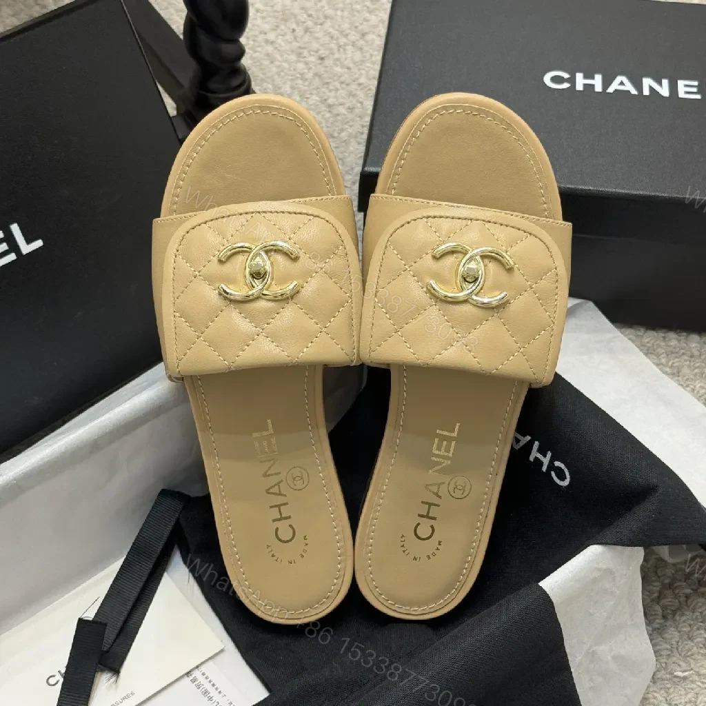 View 2 of Beige Quilted Leather Sliders with Gold Logo—Elegant Comfort