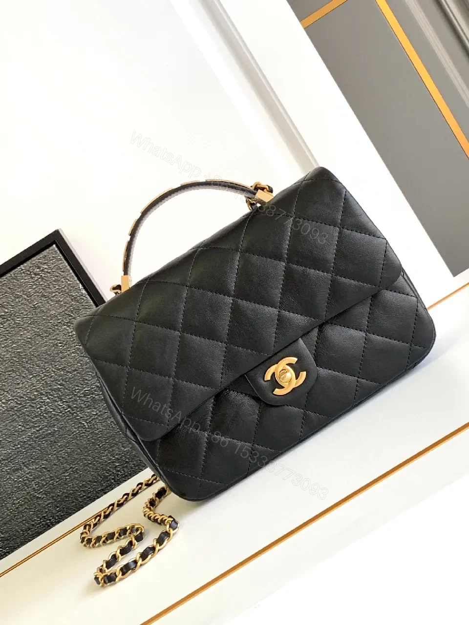 Compact Dark Leather Quilted Flap Bag with Gold Hardware — view 1