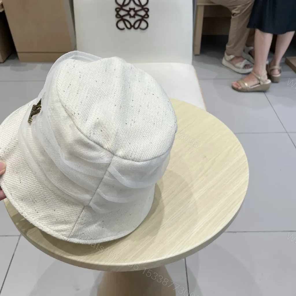 View 6 of Chic White Knit Bucket Hat with Gold Accent