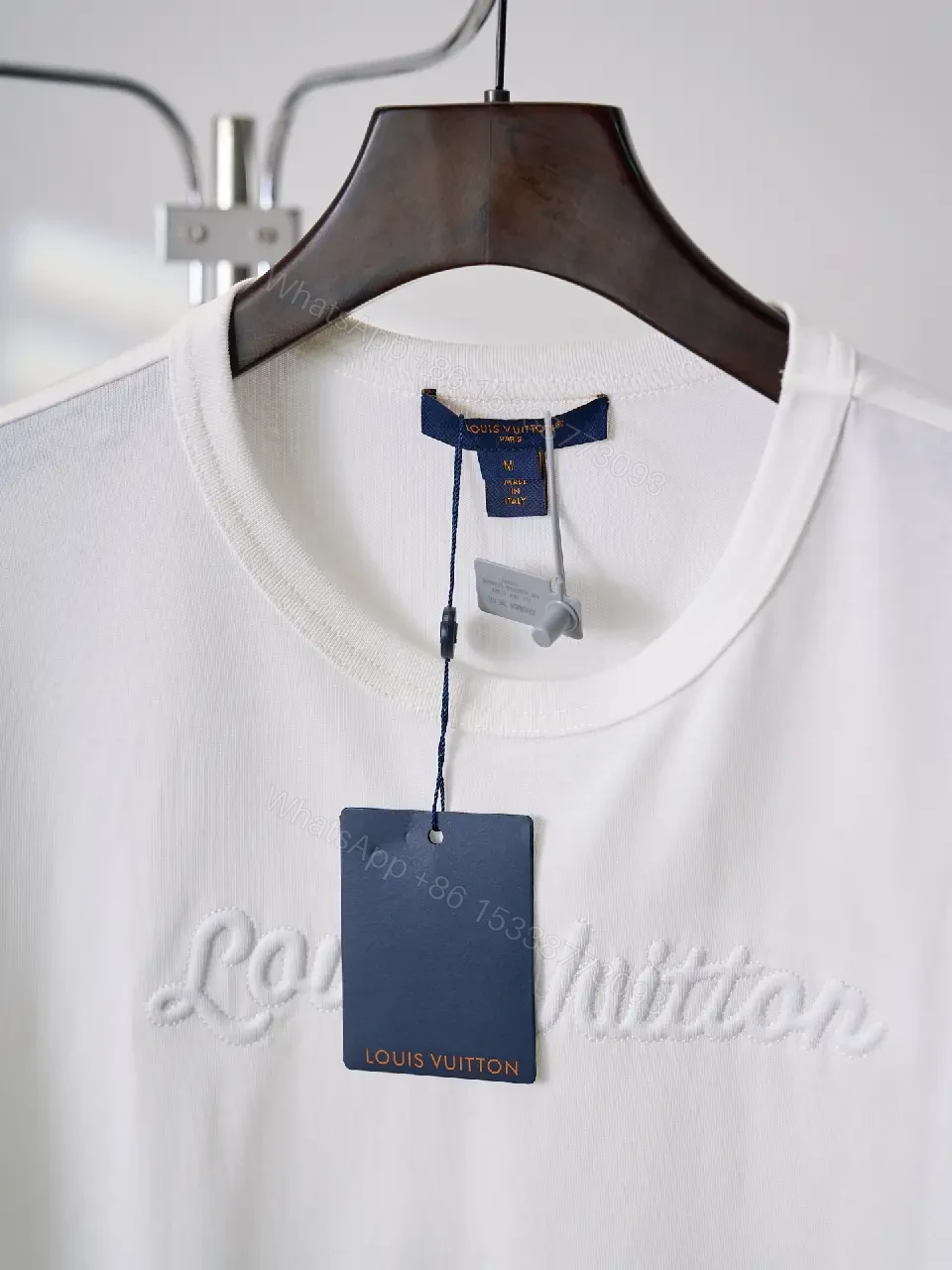View 4 of White cotton T-shirt with luxury script embroidery for everyday elegance